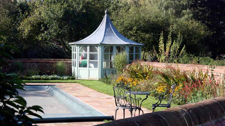 Pool house and new flint wall for a Suffolk farmhouse